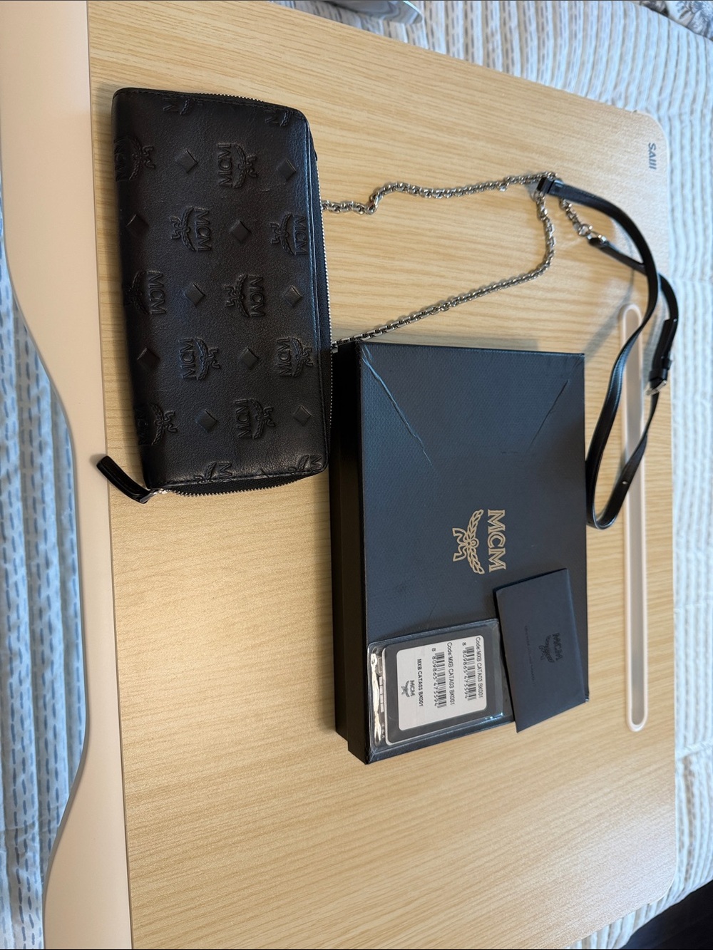 MCM Black Embossed Leather Zip Wallet with Chain Strap